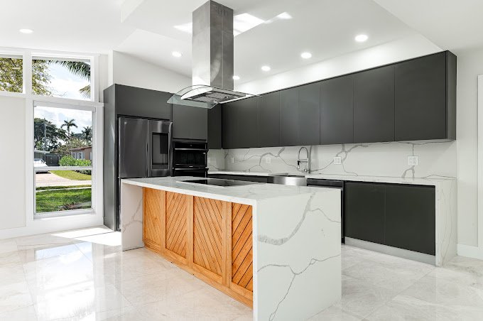 a kitchen with a large island